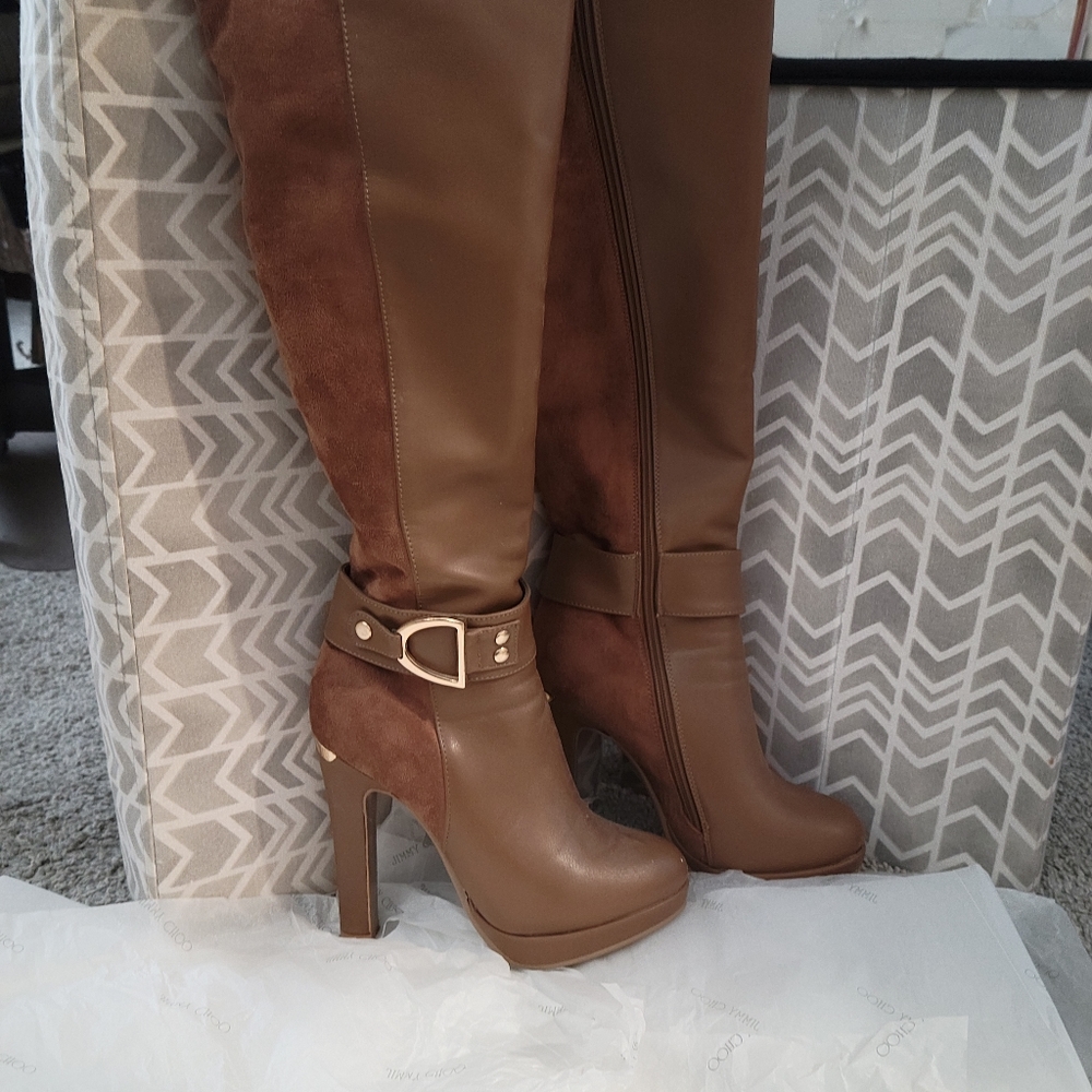 High knee, heeled boots